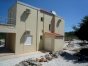 Rear of house with view to storage room