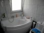 Upstairs bathroom with tub & fitted shower